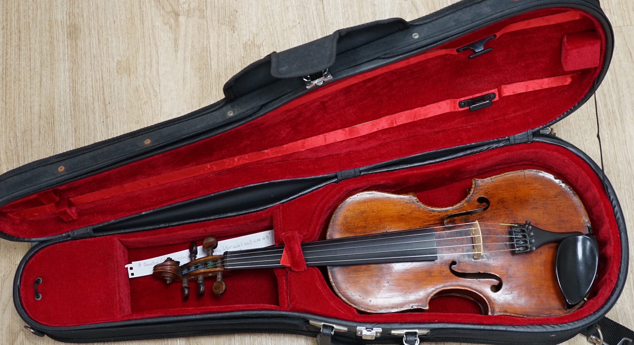 An unusual late 17th century and later cased Quinton (five string violin/viola), with early body with 18th/19th century neck and scroll, tuned for C, G, D, A, E, length of body 36.5cm, without bow